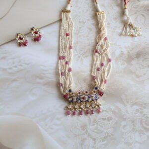 92.5 silver jewellery set with rubies, Kundan stones, freshwater pearls, and dual-sided enamel work – traditional handcrafted design