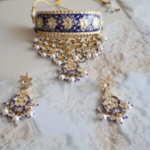 92.5 silver aad choker set with monzonite polkies, front and back enamelling, gold polish, and matching earrings.