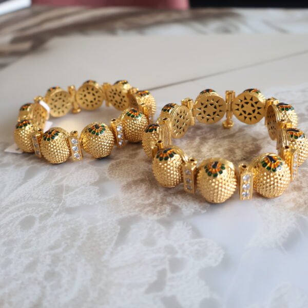 92.5 silver Gajra for hands with American stones, gold polish, and enamelling – traditional bridal jewellery